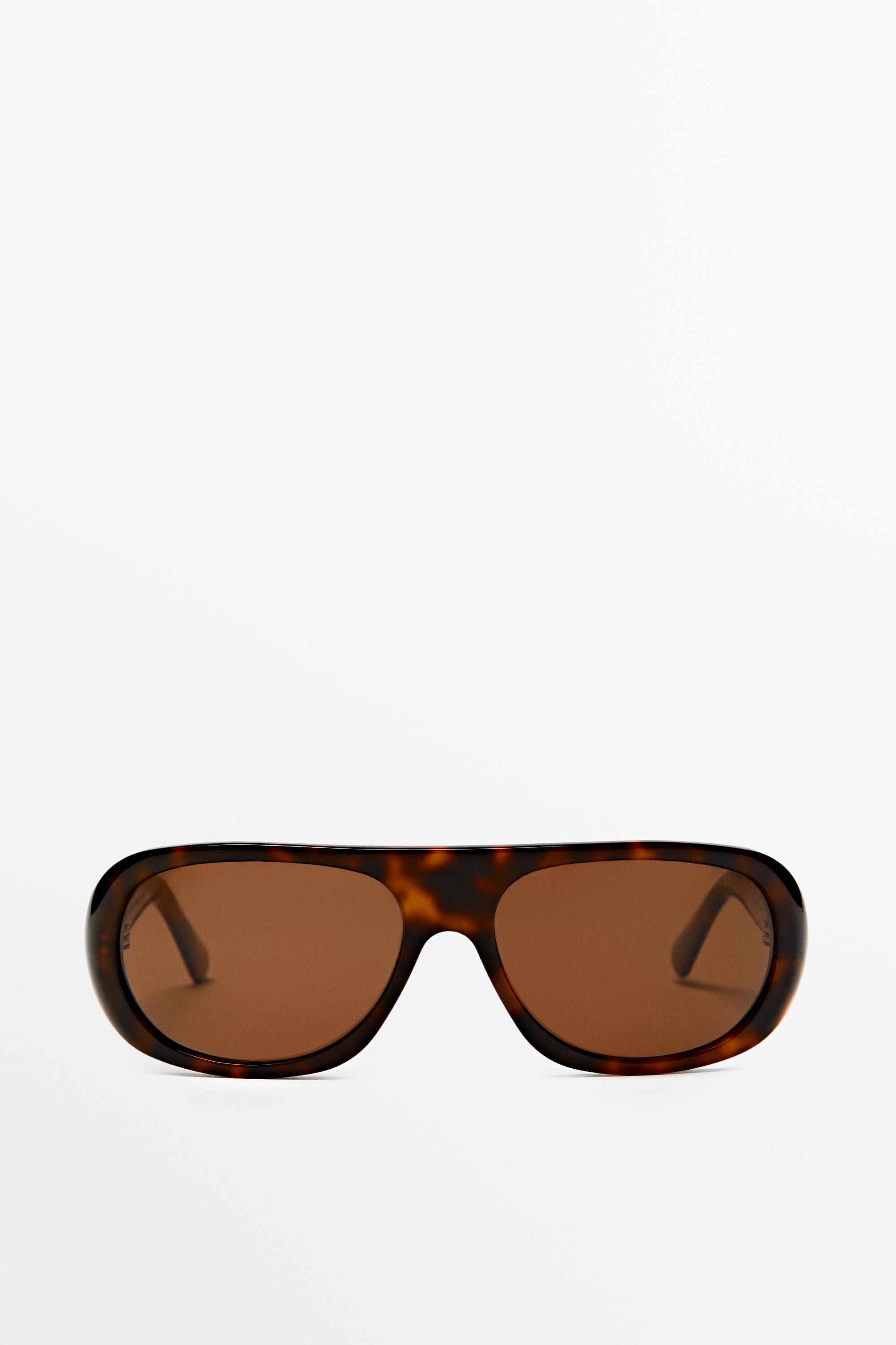 Lunettes de soleil ovales effet écaille